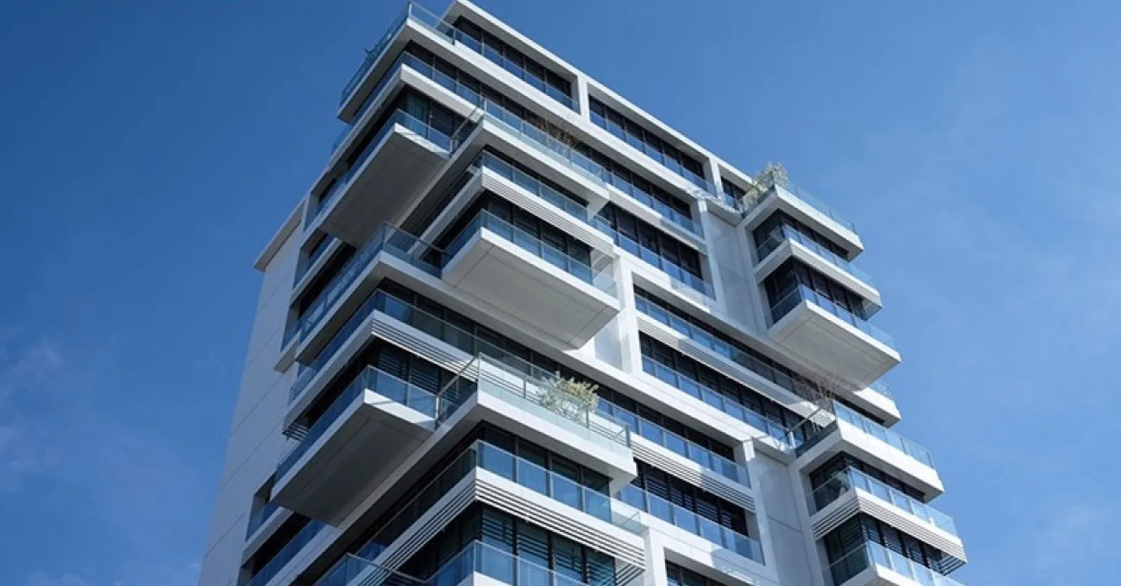 Property tokenization as an investment. Benefits for property owners & top case studies.