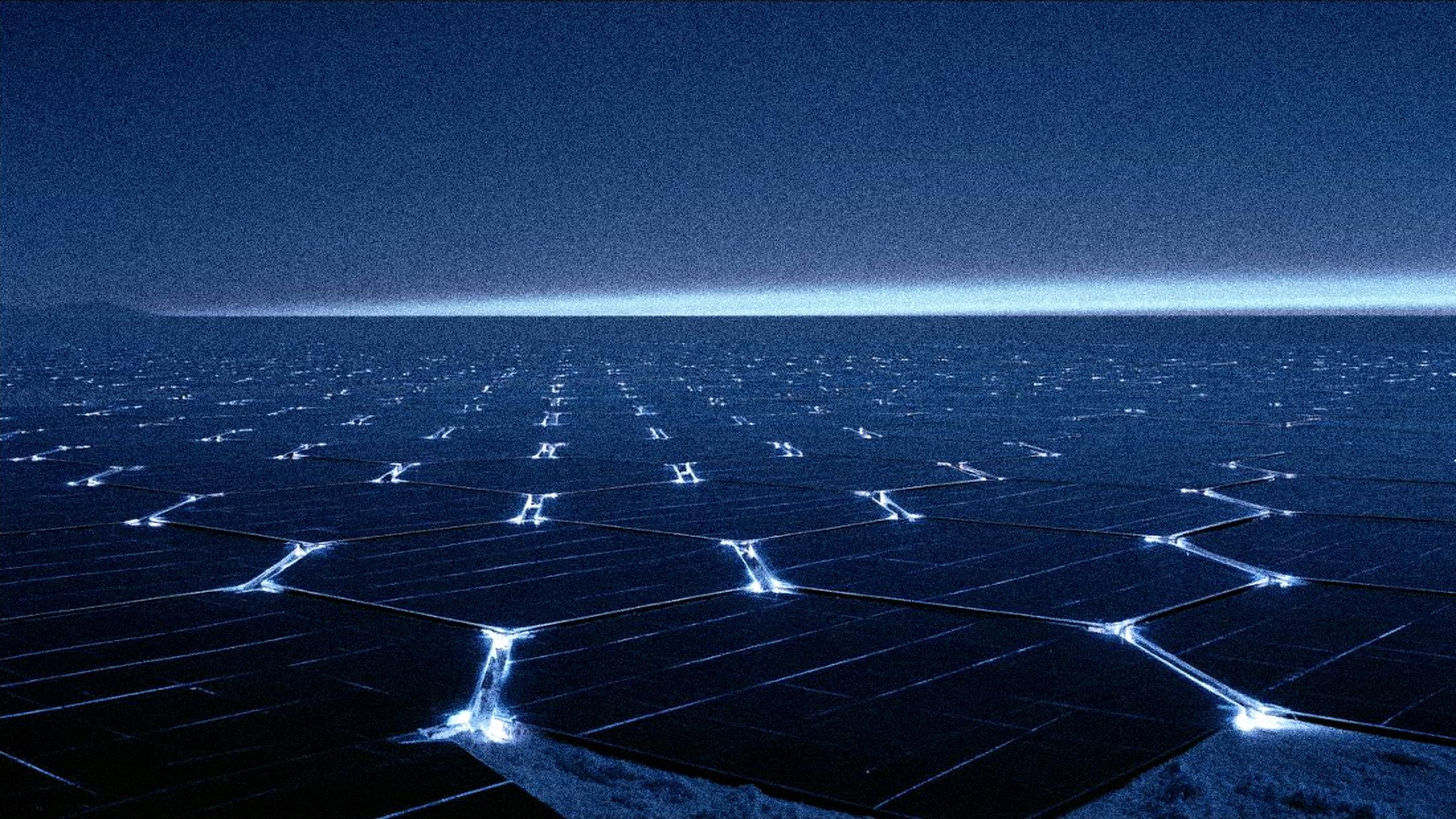Pale glass corridor receding to a single black monolith