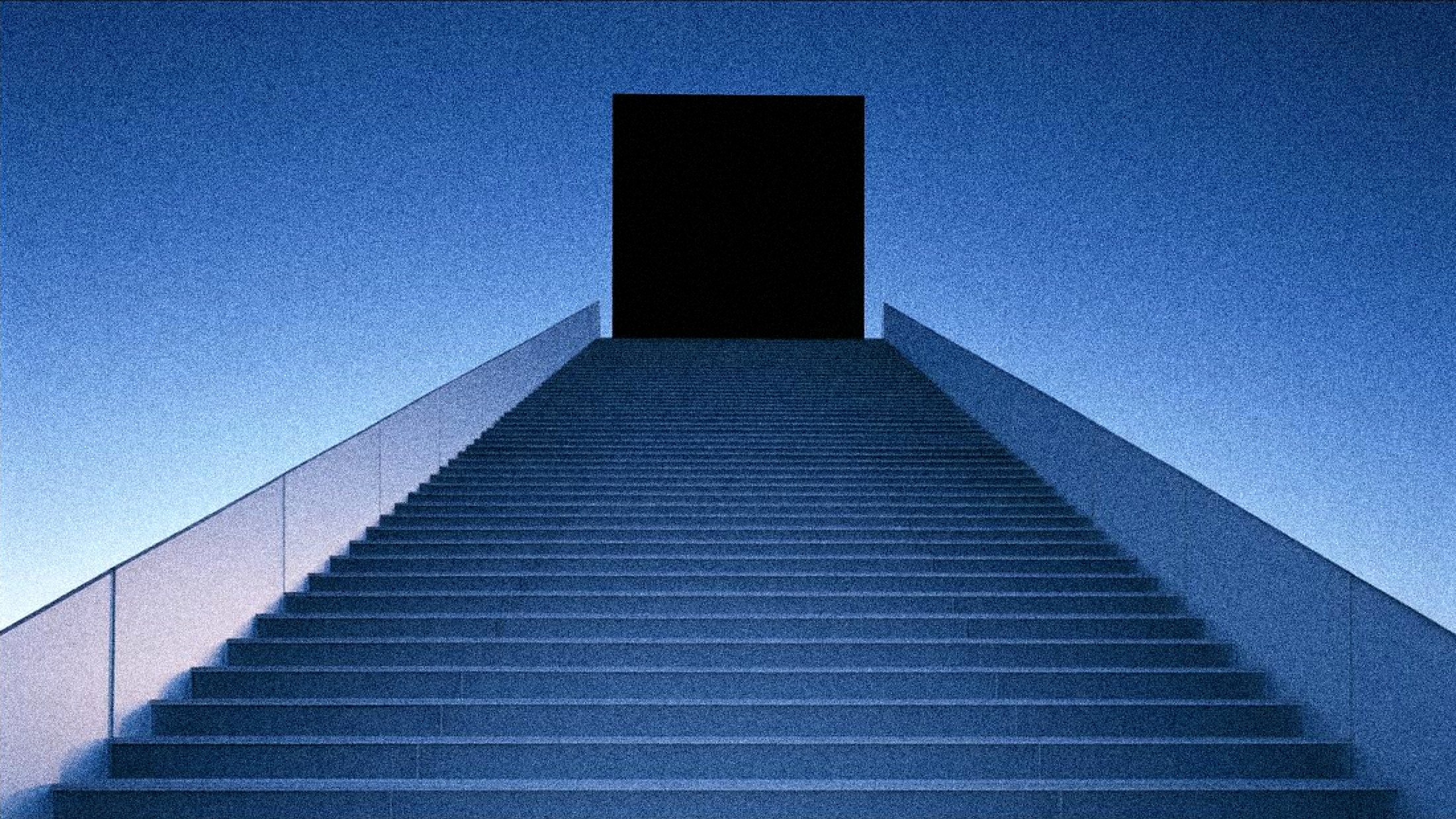 A wide staircase of pale glass rising to a black monolith under a deep blue sky